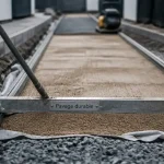 Pose pavage : allée stable, lit de pose en sable et pavés en chantier