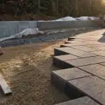 Pavé autobloquant pose : allée durable en cours, sable et joints
